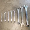 Set of 3/4 in. Craftsman Combination Wrench + Craftsman combo -V- Open End Wrench Forged In USA + 9/16 in. Craftsman Combination Wrench + Great Neck Combination Wrench metric 10mm x 10mm + 3/8 in. Craftsman Combination Wrench + 11/32 in. Craftsman Combination Wrench + Open End Wrench metric 10mm x 11mm + 1/4 in. Craftsman Combination Wrench