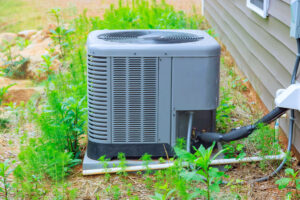 Installed on the exterior facade of the house is an outdoor air conditioning system unit