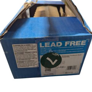 Blue cardboard box labeled 'Lead Free' with warning labels on the side and torn top flaps, suggesting opened packaging.