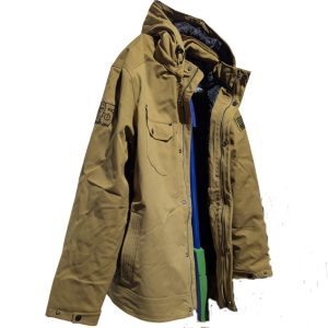 Beige winter parka with a hood, front zipper and snap buttons, showing multiple pockets and a blue inner lining.