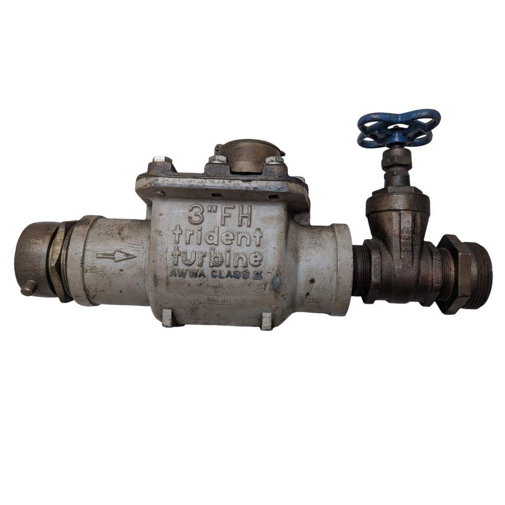 Neptune-3-FH-trident-turbine-awwa-class-II_16 | Chicago HVAC tools and supplies Inline industrial valve with a blue circular handwheel on the right and a metal body marked '3" FH triden turbine'.