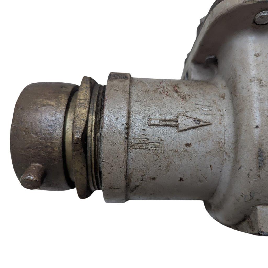 Neptune-3-FH-trident-turbine-awwa-class-II_19 | Chicago HVAC tools and supplies Metal pipe fitting/valve with an embossed arrow indicating flow direction; dirty, worn surface.