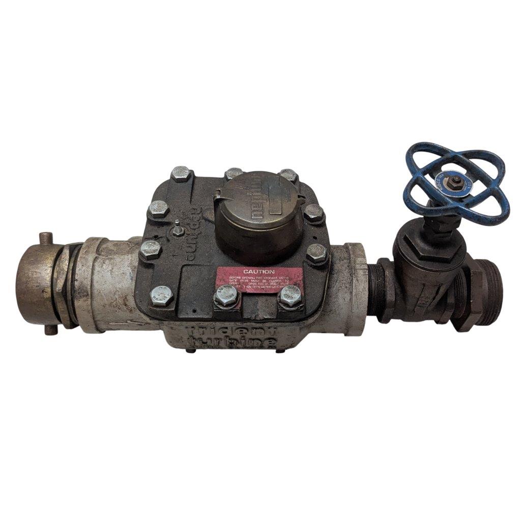 Neptune-3-FH-trident-turbine-awwa-class-II_4 | Chicago HVAC tools and supplies Industrial metal valve assembly with blue handwheel on the right and flange connections on both ends, used to open or close flow.