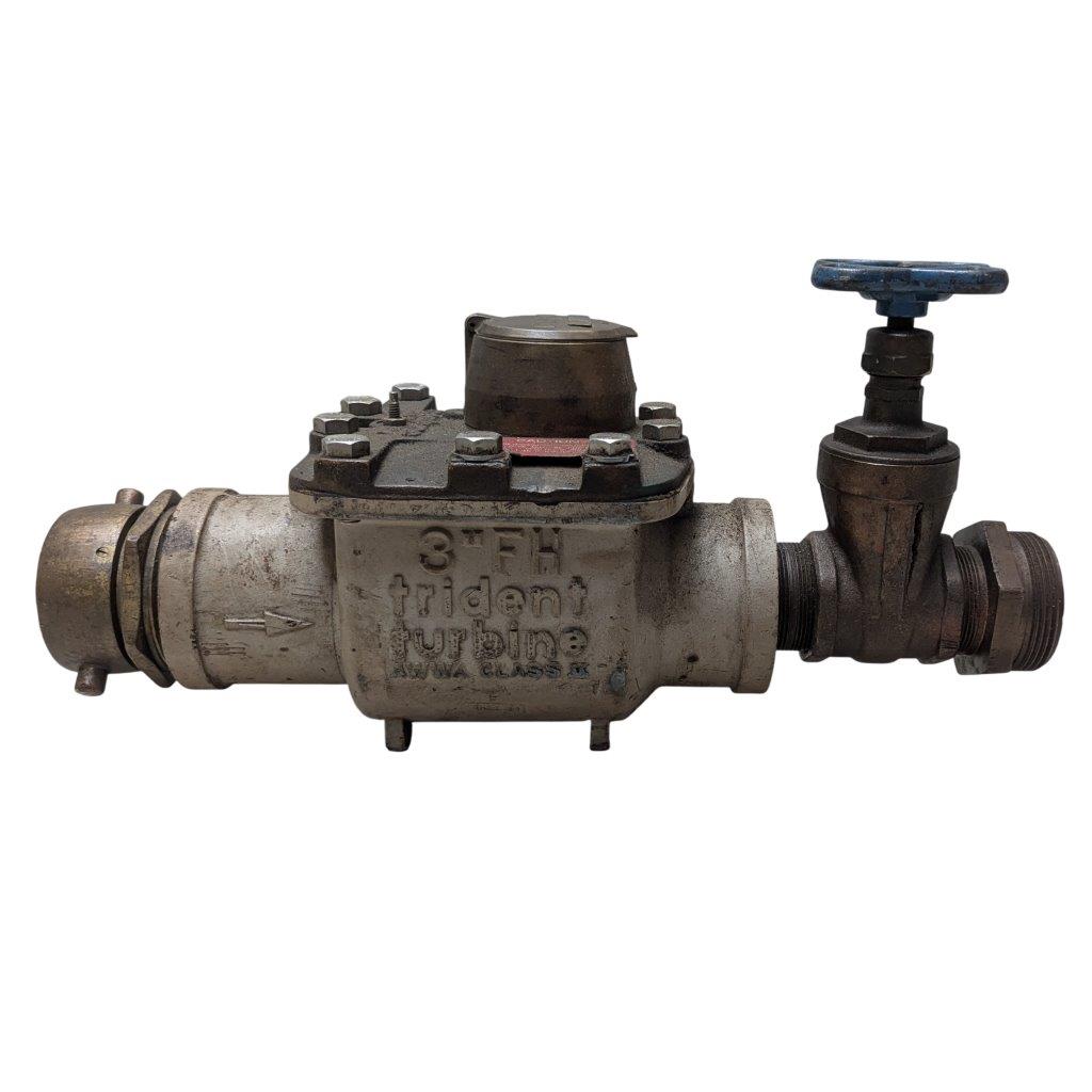 Neptune-3-FH-trident-turbine-awwa-class-II_5 | Chicago HVAC tools and supplies Industrial metal valve with a blue handwheel on the right and threaded ends, showing a worn surface and arrow marking on the body.