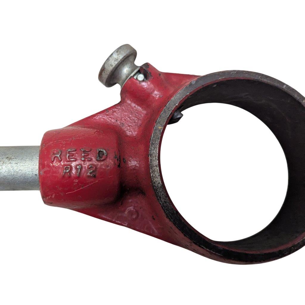 REED-R-12_5 | Chicago HVAC tools and supplies Red metal pipe clamp with a large circular opening, likely a bicycle stem or tube holder ready to secure a round tube.