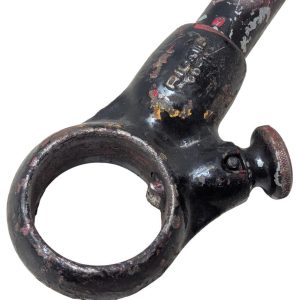 RIDGID-00-R_10 | Chicago HVAC tools and supplies Close-up of a vintage black metal tool with a large circular ring at one end, showing rust and chipped paint