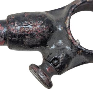 RIDGID-00-R_6 | Chicago HVAC tools and supplies Close-up of a weathered black metal tool component with a knurled knob, showing chipped paint and rust.