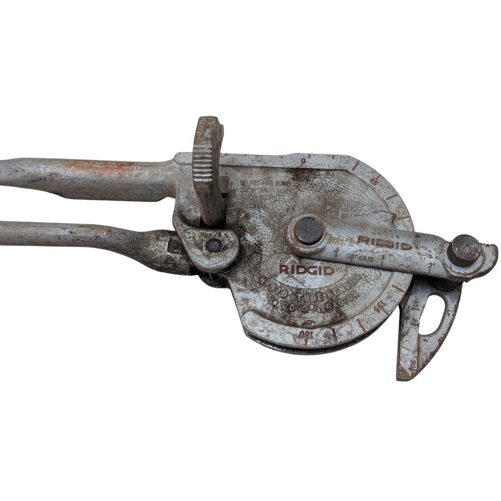 RIDGID-NO-378-Tube-Bender_10 | Chicago HVAC tools and supplies Rusty tubing cutter tool with a side crank and wheel, labeled Ridgid, used for cutting metal tubes.