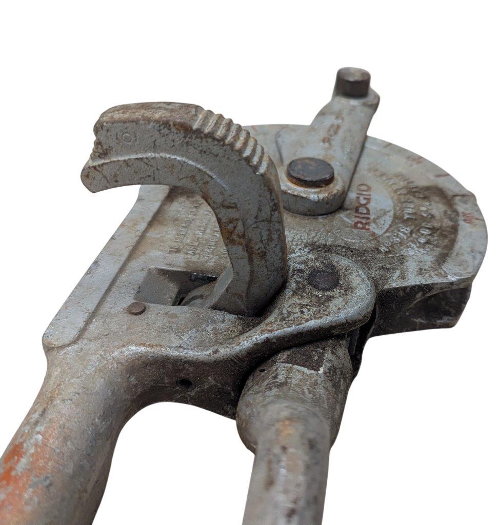RIDGID-NO-378-Tube-Bender_11 | Chicago HVAC tools and supplies Close-up of a rusty vintage adjustable pipe wrench with serrated jaws and adjustment screw.