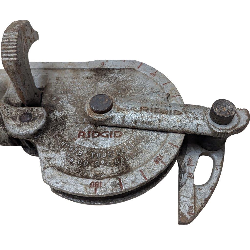 RIDGID-NO-378-Tube-Bender_3 | Chicago HVAC tools and supplies Rusty Ridgid pipe threading tool with crank handle and gauge marks.