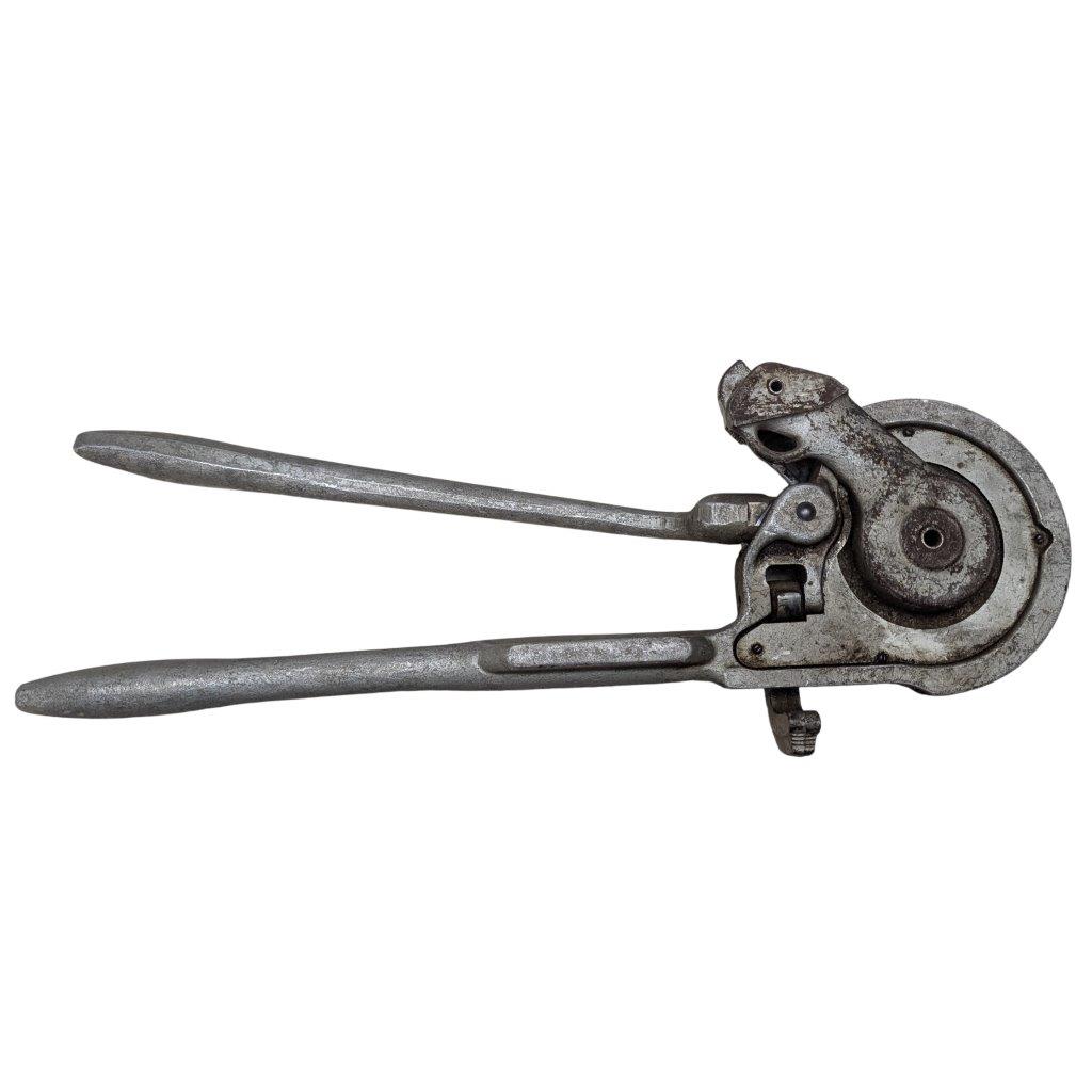 Ridgid-358-Model-Geared-Ratchet-Tube-Bender_4 | Chicago HVAC tools and supplies Vintage rusty hand rivet tool with long handles and a circular head, shown in side view.