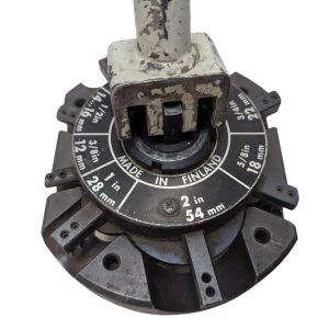 T-DRILL-ND-54-Tube-End-Notcher_11 | Chicago HVAC tools and supplies Rotary tool head with a circular dial showing measurements (2 in / 54 mm) and 'Made in Finland' text; worn and dusty appearance.