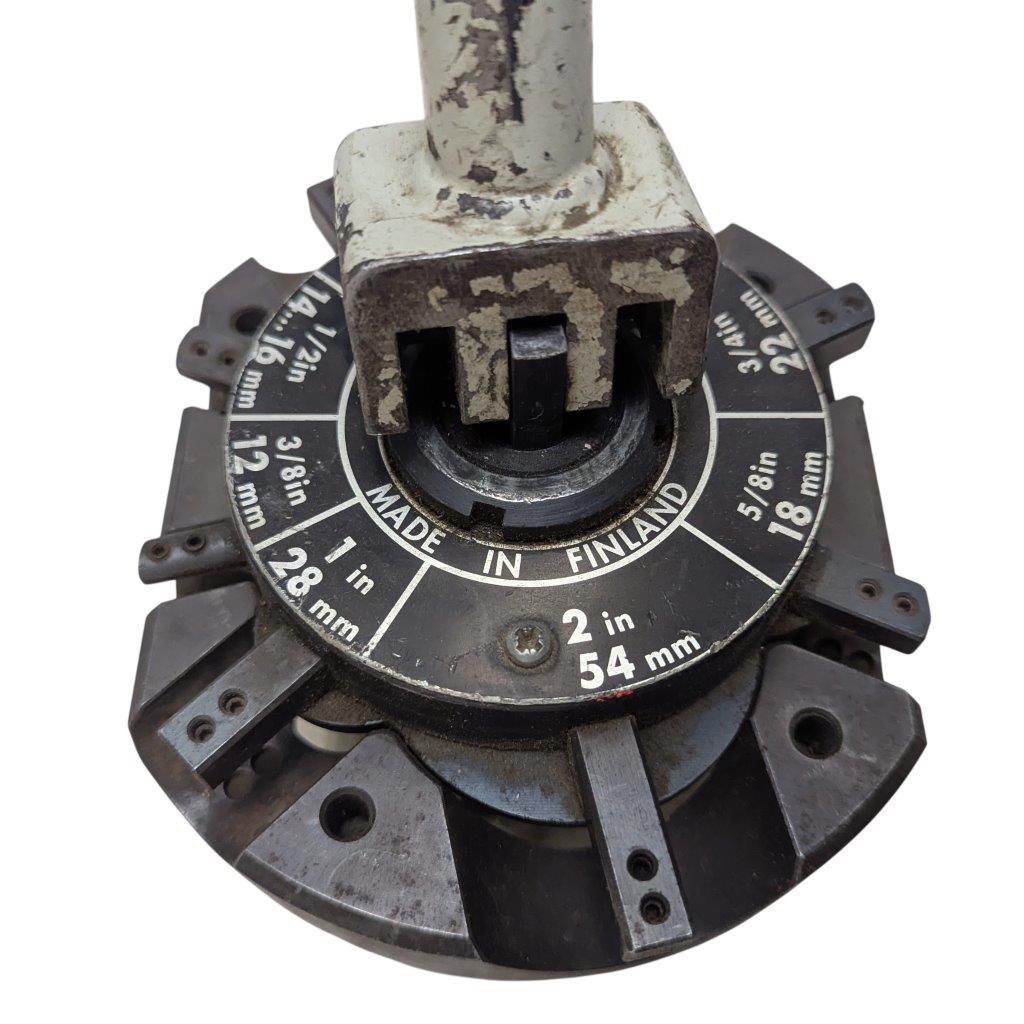 T-DRILL-ND-54-Tube-End-Notcher_11 | Chicago HVAC tools and supplies Rotary tool head with a circular dial showing measurements (2 in / 54 mm) and 'Made in Finland' text; worn and dusty appearance.