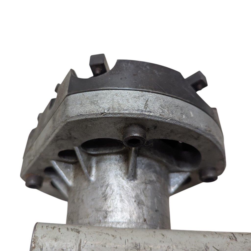T-DRILL-ND-54-Tube-End-Notcher_16 | Chicago HVAC tools and supplies Round metal housing on a vertical shaft with a black plastic top, showing bolt holes around the flange and a central boss