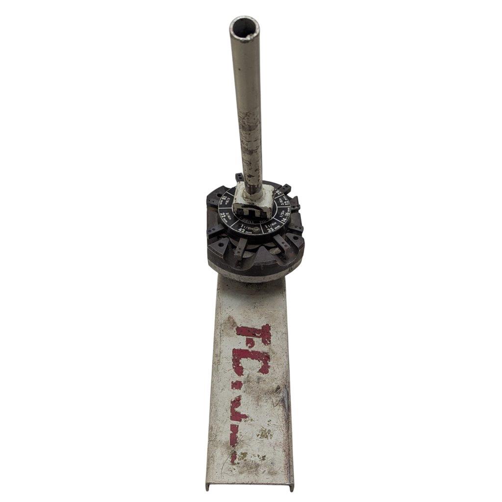 T-DRILL-ND-54-Tube-End-Notcher_4 | Chicago HVAC tools and supplies Industrial manual control with a vertical shaft atop a rotary index dial mounted on a weathered base.