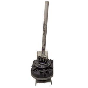 T-DRILL-ND-54-Tube-End-Notcher_8 | Chicago HVAC tools and supplies Vintage mechanical calibration tool: tall, rusty metal lever attached to a circular, multi-position dial at the base.
