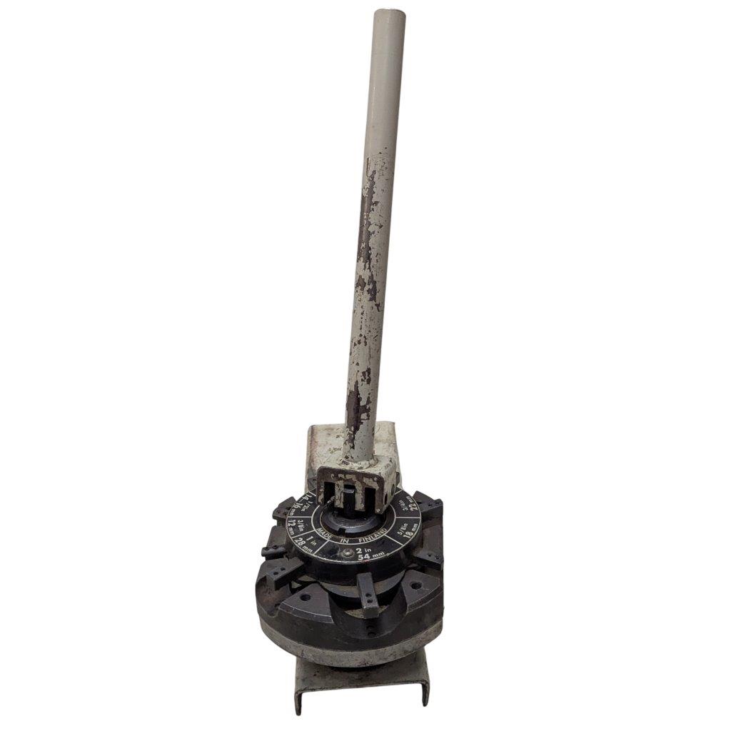 T-DRILL-ND-54-Tube-End-Notcher_8 | Chicago HVAC tools and supplies Vintage mechanical calibration tool: tall, rusty metal lever attached to a circular, multi-position dial at the base.