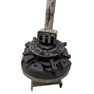 T-DRILL-ND-54-Tube-End-Notcher_9 | Chicago HVAC tools and supplies Close-up of a worn circular dial on a rotary jig with measurement marks and a vertical metal handle, used to set precise angles.